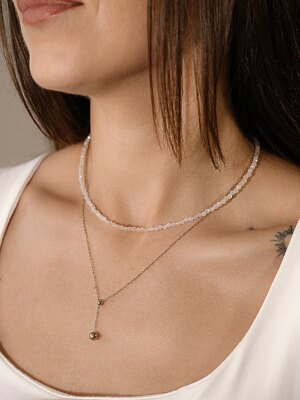 menulio akmens verinys ir grandinele